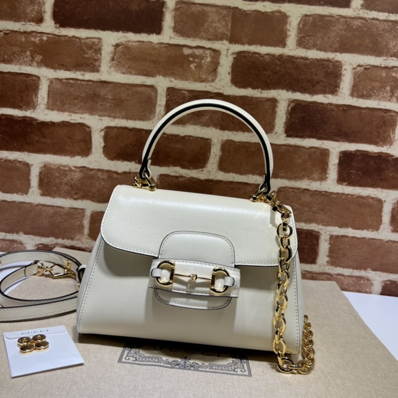 G*u*i top handle bags